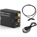 Black digital to analog audio converter with Toslink and coaxial inputs and RCA outputs