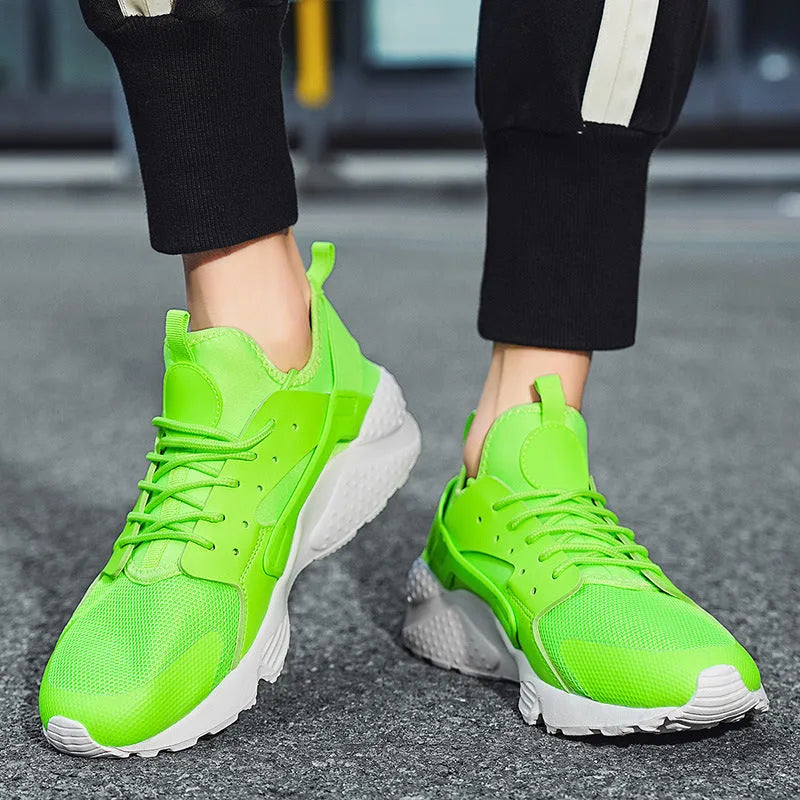 Men's low-top casual sneakers with mesh upper, round toe, and cross shoulder straps in multiple colour options