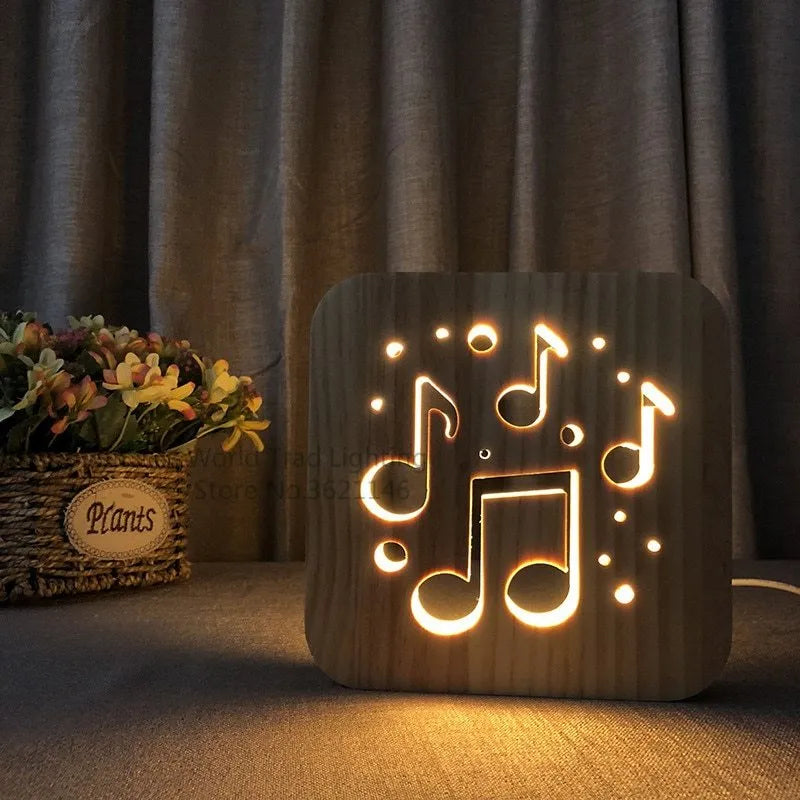 Pine wood cube LED atmosphere lamp with warm white light, showing USB cable and button switch.