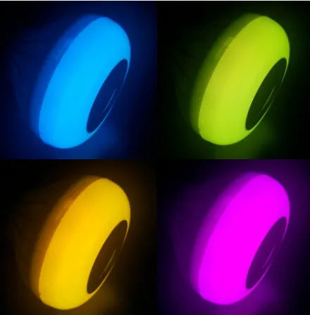 White smart LED Bluetooth speaker light bulb with E27 screw base for colour-changing mood lighting.