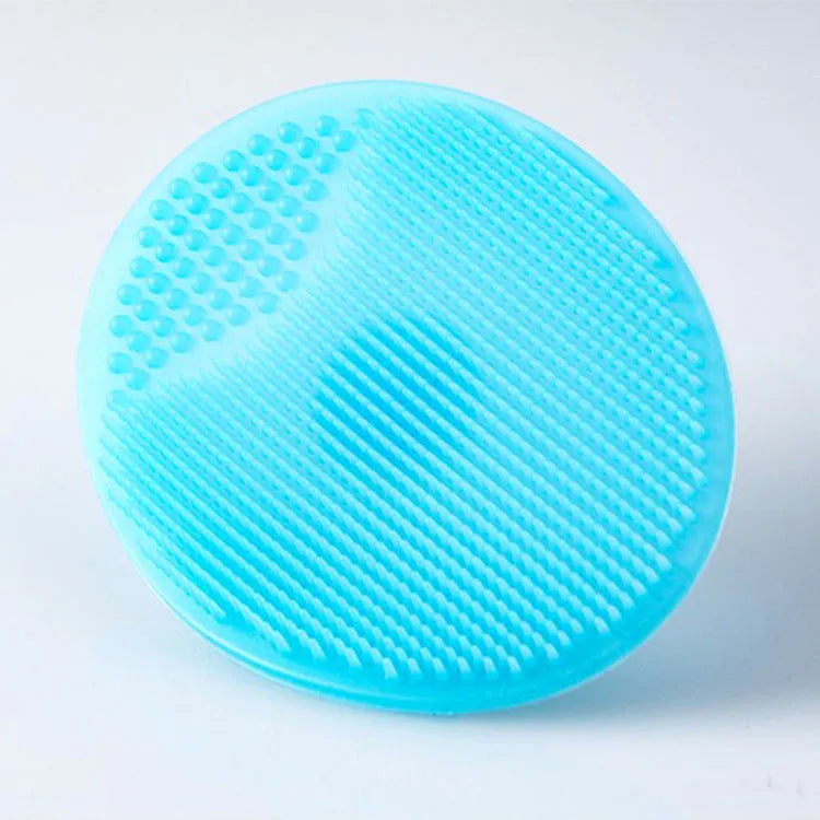 Silicone facial brush with three bristle types: tiny, middle, coarse; blue colour; 53mm size; for face cleansing and massage.