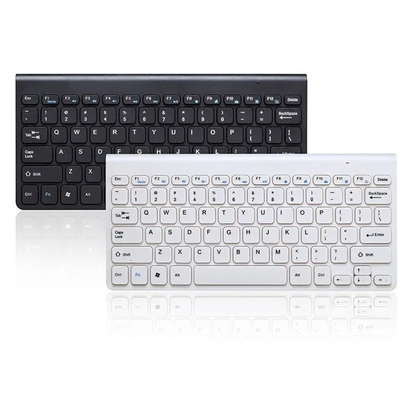 Black wireless keyboard and mouse set on wooden desk with USB receiver