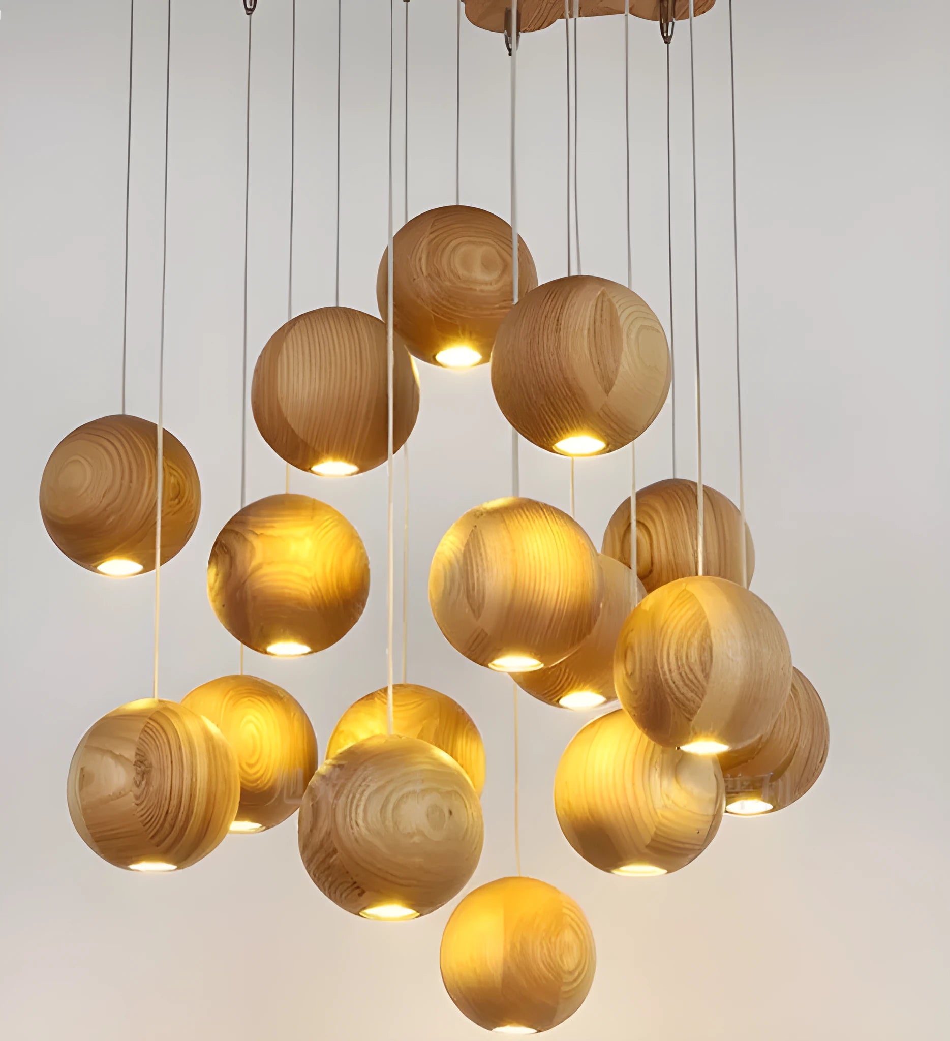 Nordic solid wood ball pendant chandelier with adjustable cord, shown in single and three-head style options.