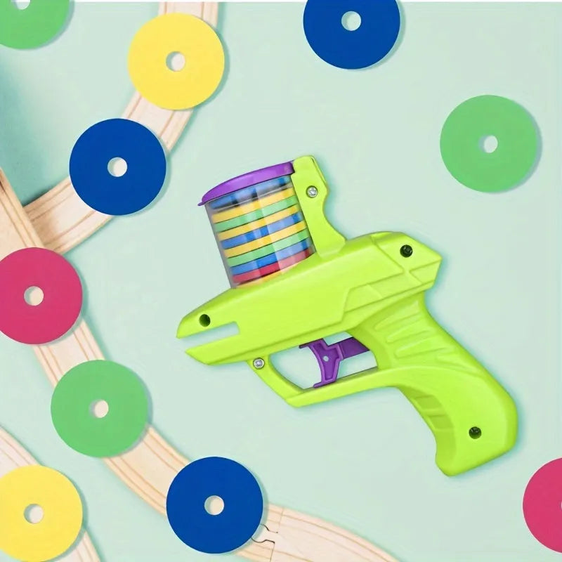 Interactive cat toy launcher with foam disc in green or purple colour options