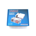 Compact black NES mini retro game console with two rectangular controllers on a white background