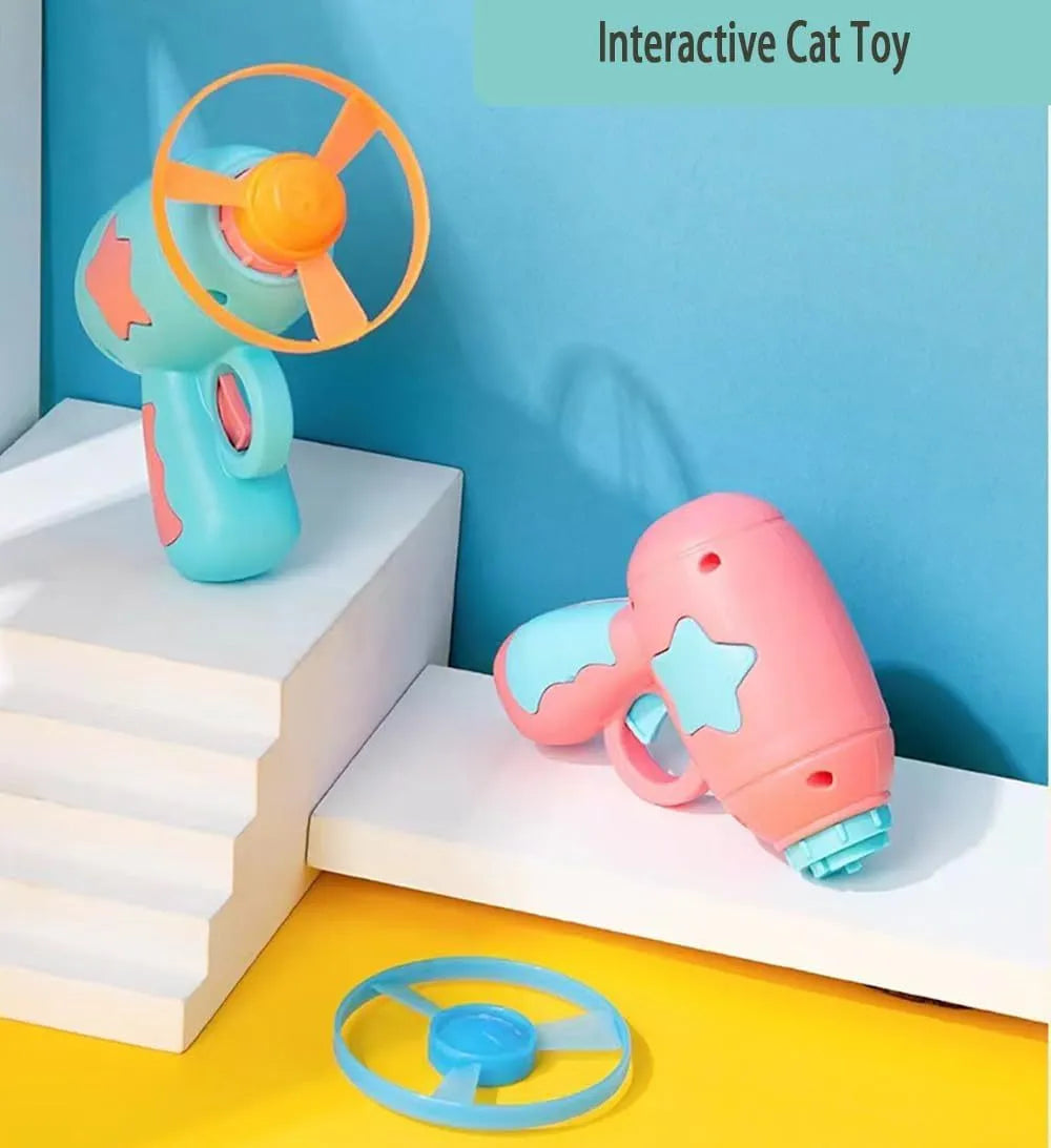 Blue interactive cat toy gun with plastic frisbee on launcher head