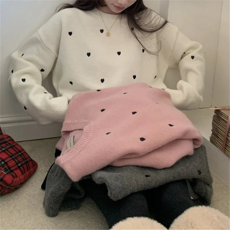 Women's acrylic pullover sweater with embroidery detail in milky white colour