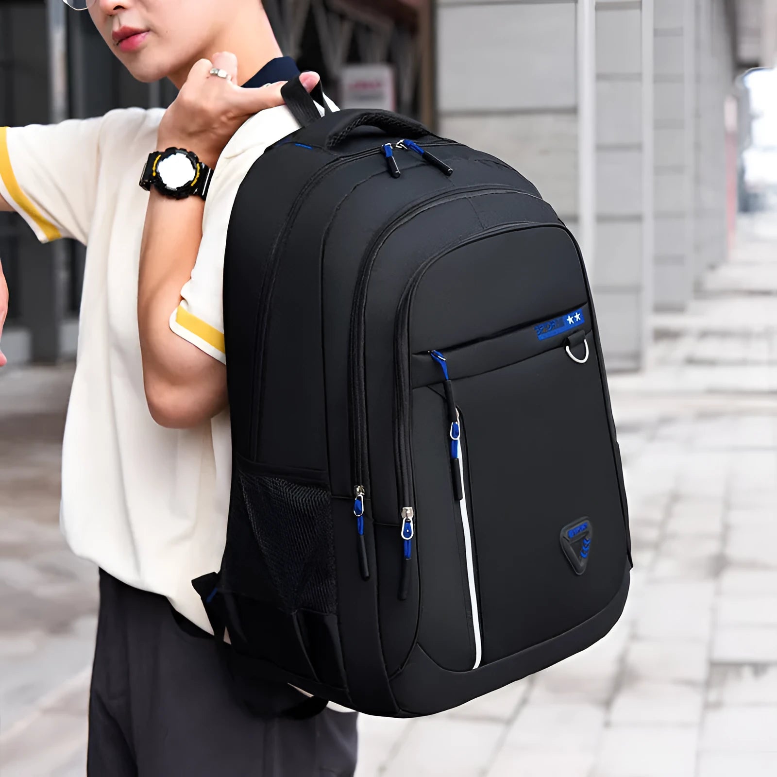 Men's Oxford cloth schoolbag in black showing spliced pattern design and air pillow belt system