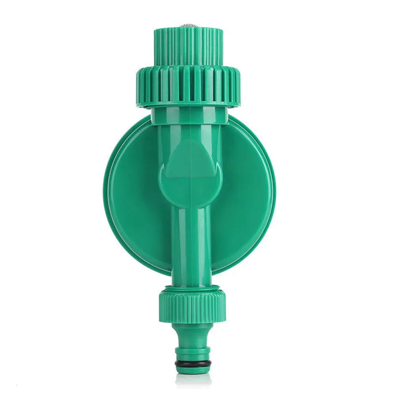 Automatic watering timer in green for drip irrigation with dial interface and brass connectors