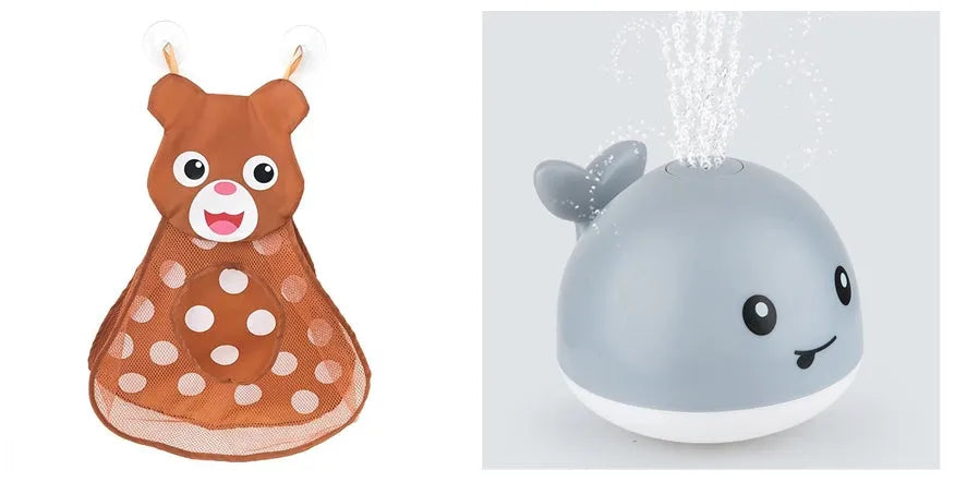 White and blue electric whale bath toy spraying water with lights on a base.