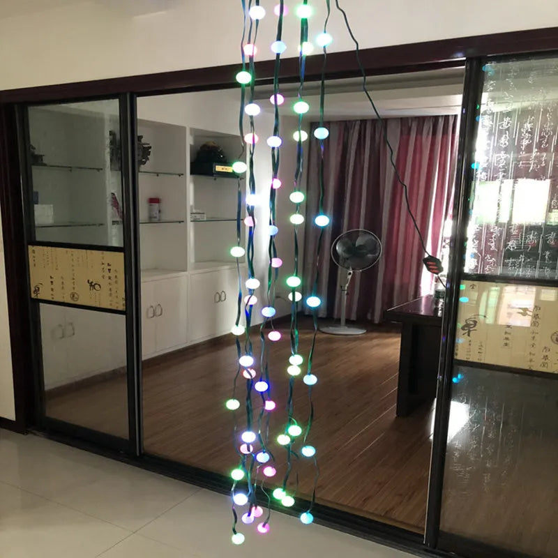 64 LED Dazzler shower tree lights on a Christmas tree, 1.8 metre length, with colourful illumination