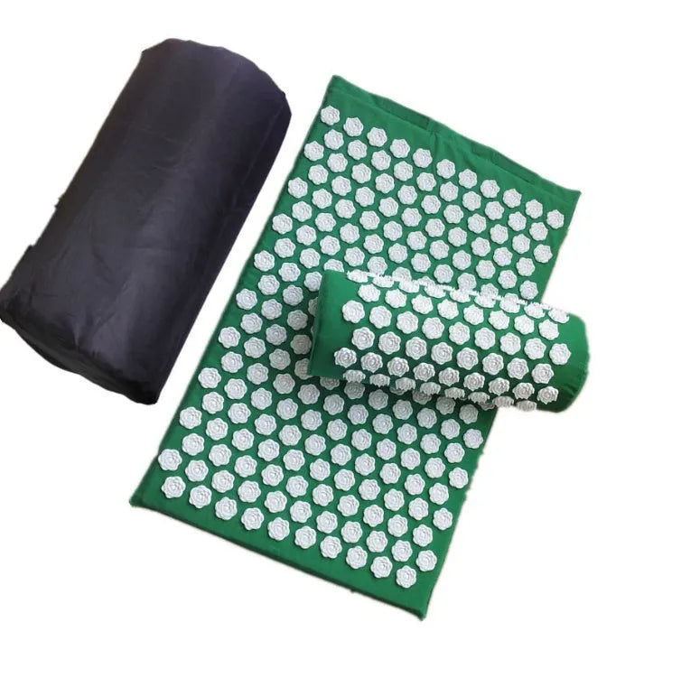Lotus acupressure mat set with pillow and cloth carry bag on floor