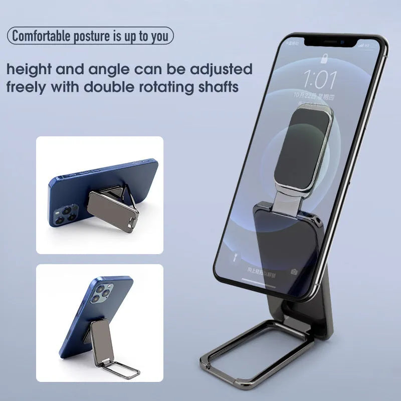 Foldable zinc alloy phone holder ring buckle in silver on a desk propping an iPhone at an angle.