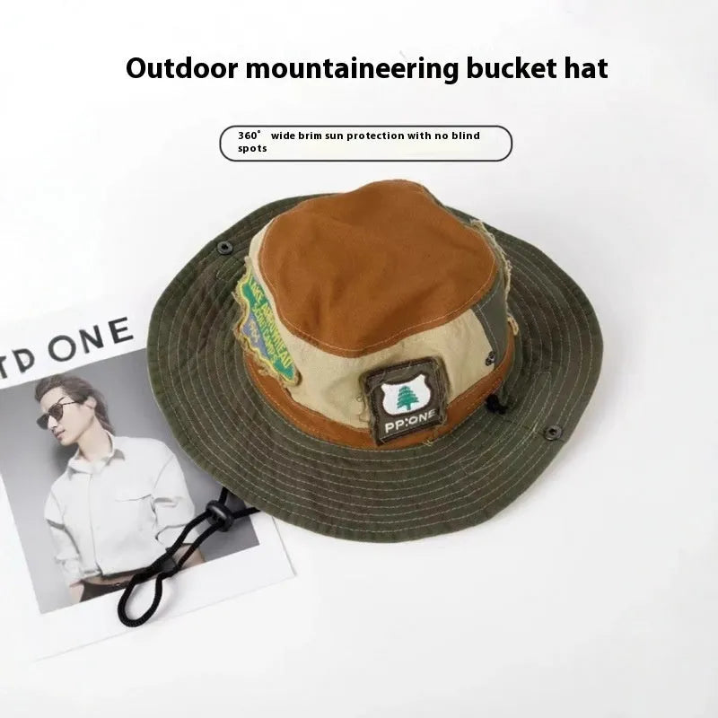 Army green cotton fisherman hat with patchwork fabric and flat top crown design