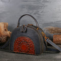 Vintage leather handbag showing interior compartments including ID holder and phone pouch