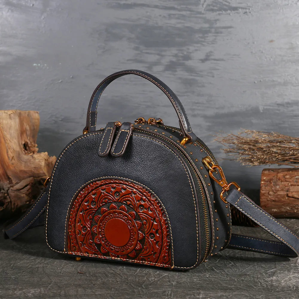 Vintage leather handbag showing interior compartments including ID holder and phone pouch