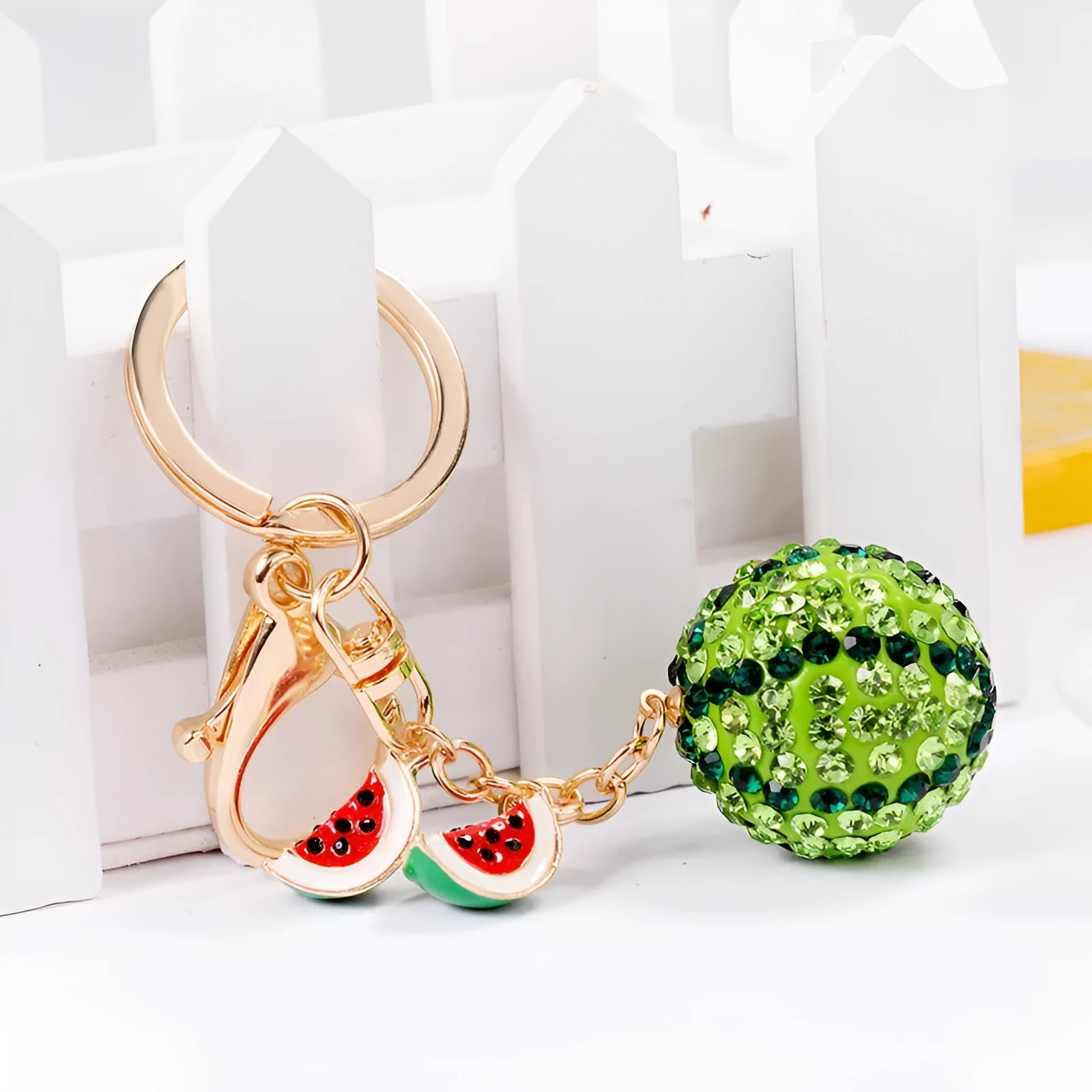 Green watermelon-shaped zinc alloy keychain measuring 12cm with metal chain attachment