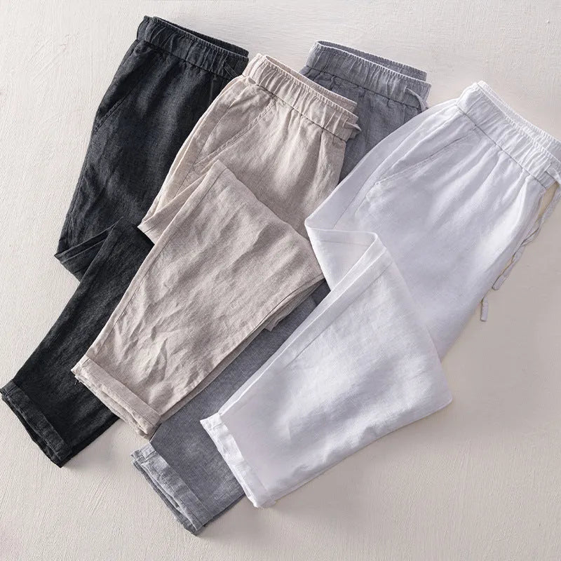 Linen breathable straight trousers for men in khaki colour, mid-waist cut on white background