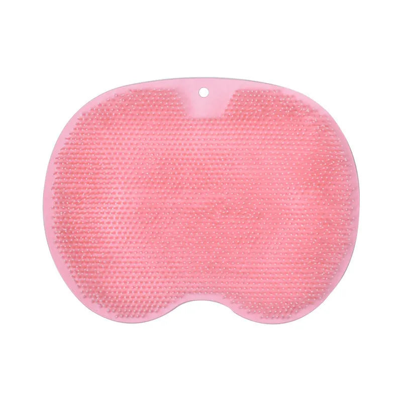Non-slip bath mat with silicone bristles and suction cup base in a shower