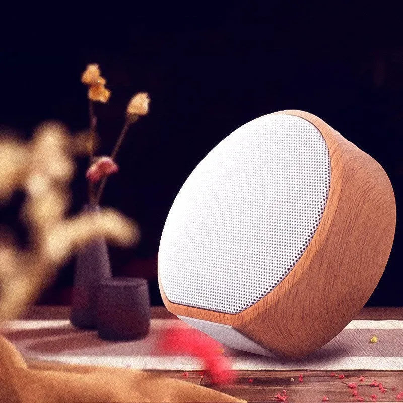 Wood grain Bluetooth speaker in white colour with built-in battery and USB interface