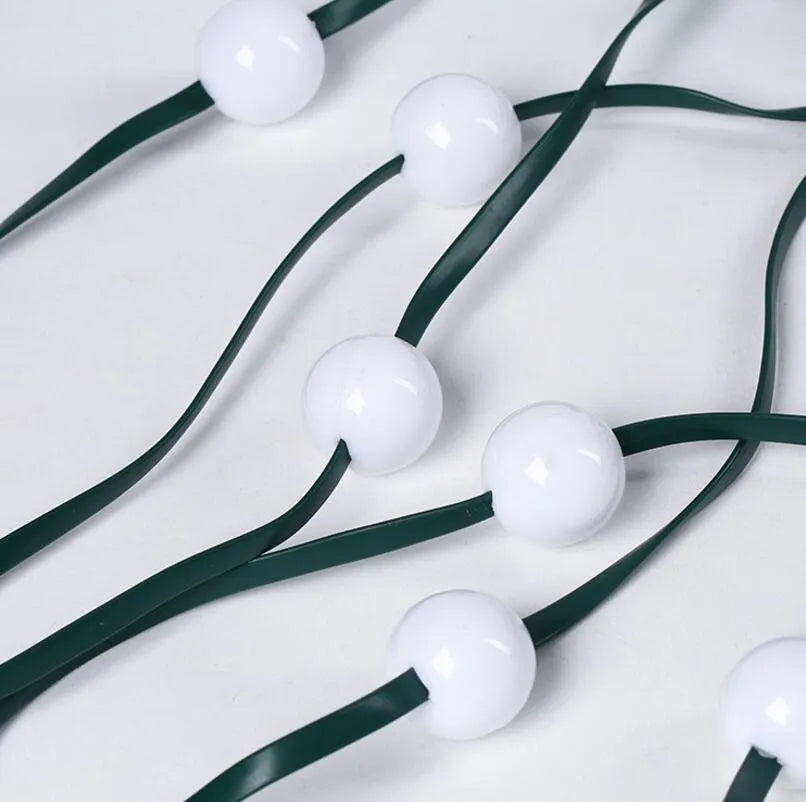 64 LED Dazzler shower tree lights on a Christmas tree, 1.8 metre length, with colourful illumination