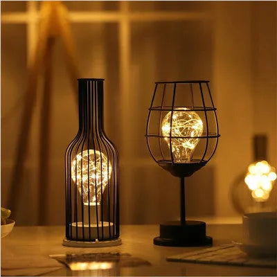 Iron hollow table lamp in red wine glass design with warm white LED lighting