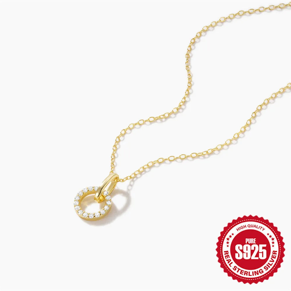 Gold tone S925 sterling silver adjustable clavicle chain necklace with a geometric interlocking zircon pendant.