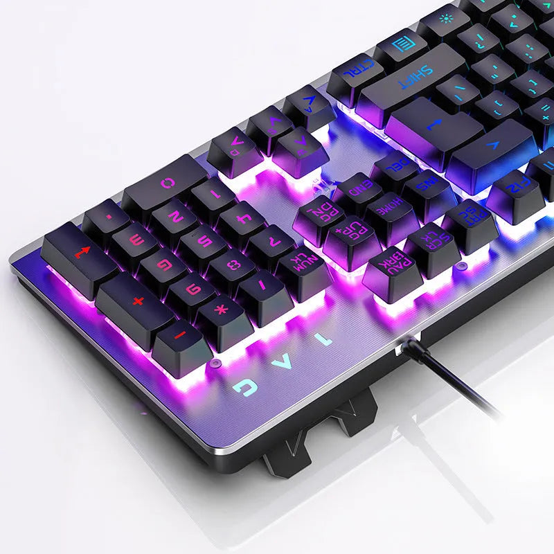 K002 metal-effect wired gaming keyboard with rainbow backlight and 104 keys on a desk