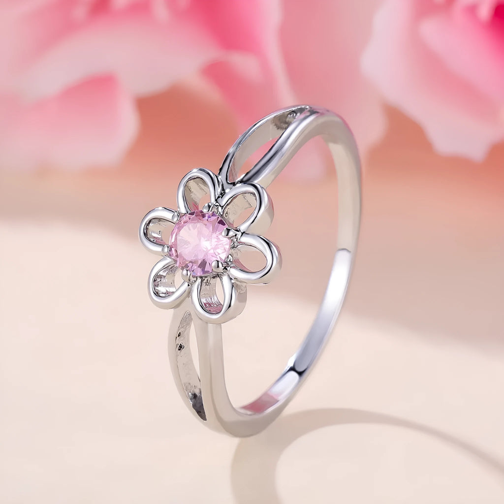 Lady's flower hollowed fashion simple ring in copper with platinum pink diamond electroplated finish
