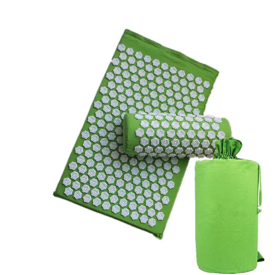 Lotus acupressure mat set with pillow and cloth carry bag on floor