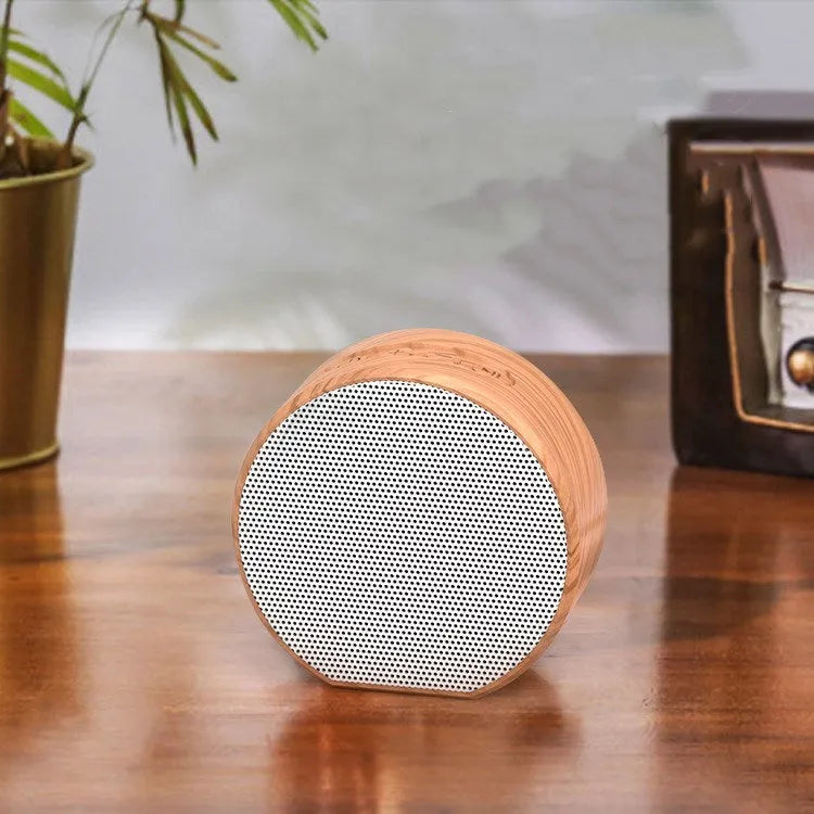 Wood grain Bluetooth speaker in white colour with built-in battery and USB interface