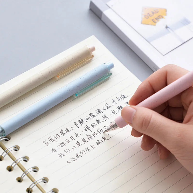 Jinqi push-type gel pen 0.5mm black ink with retractable tip on white background
