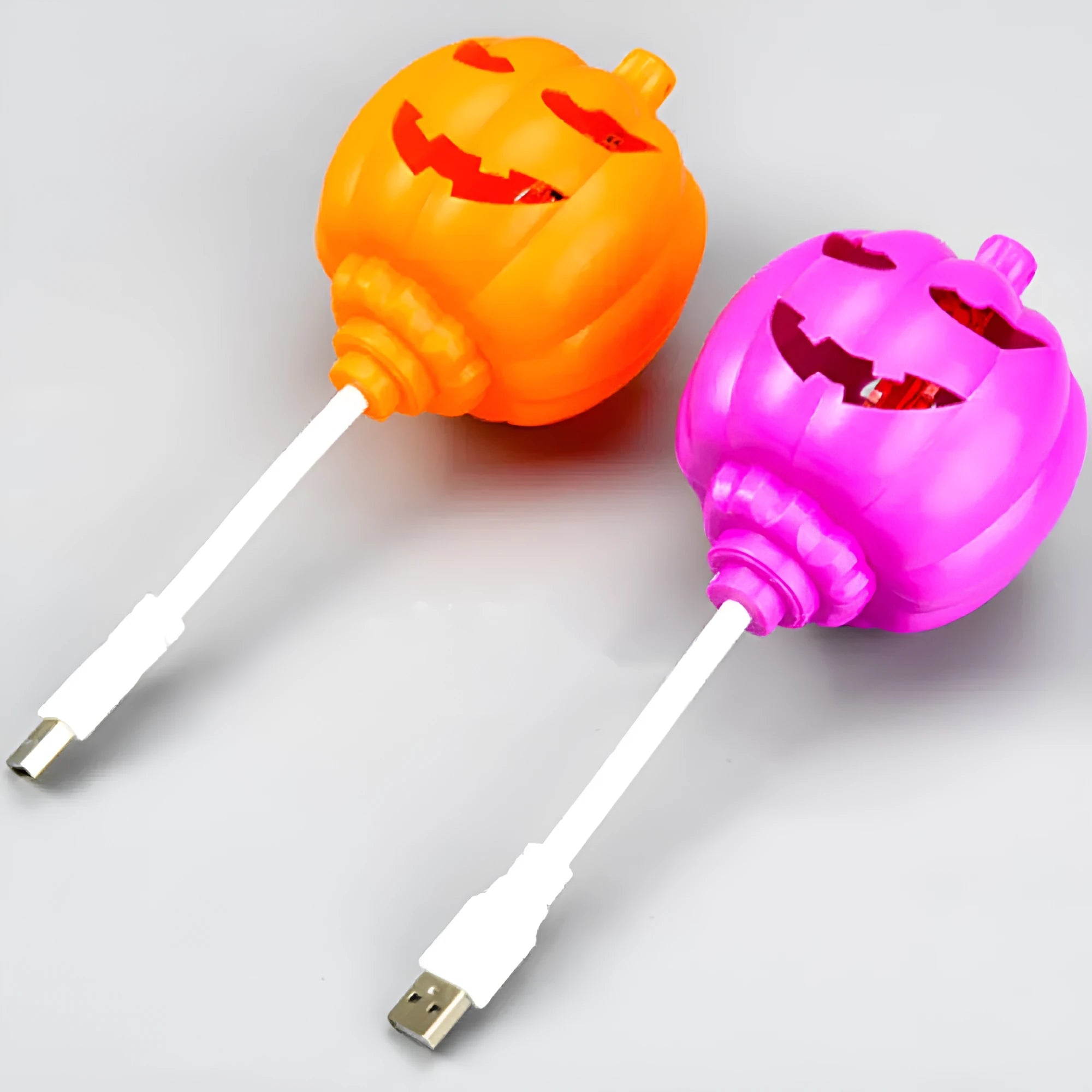 Plastic pumpkin lamp with USB cable, purple or yellow light option, 8.3cm wide by 22cm tall