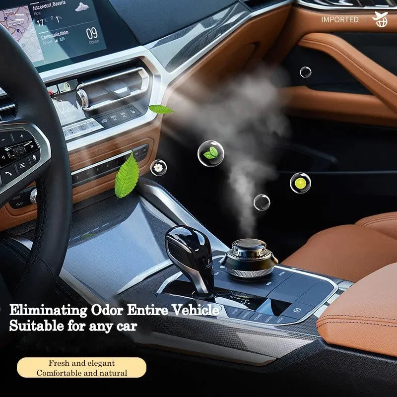 Solar-powered kinetic double ring rotating car air freshener fragrance diffuser on a car dashboard.