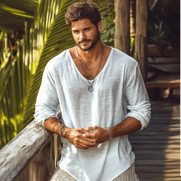 Beige V-neck long-sleeved slim fit t-shirt laid flat.