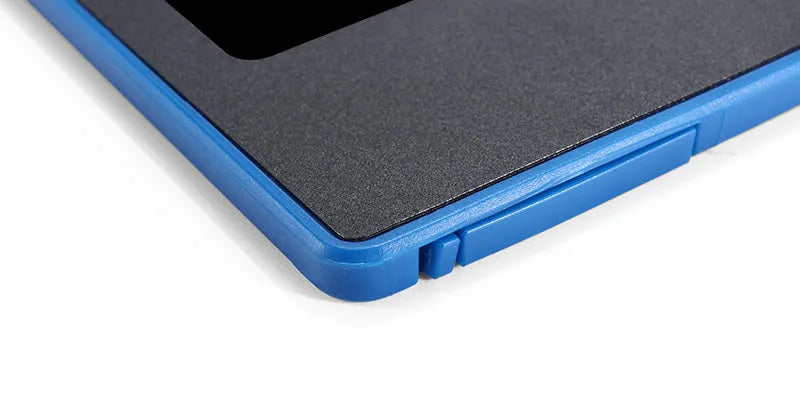 LCD writing tablet with pressure-sensitive blue-green screen and black ABS frame on desk