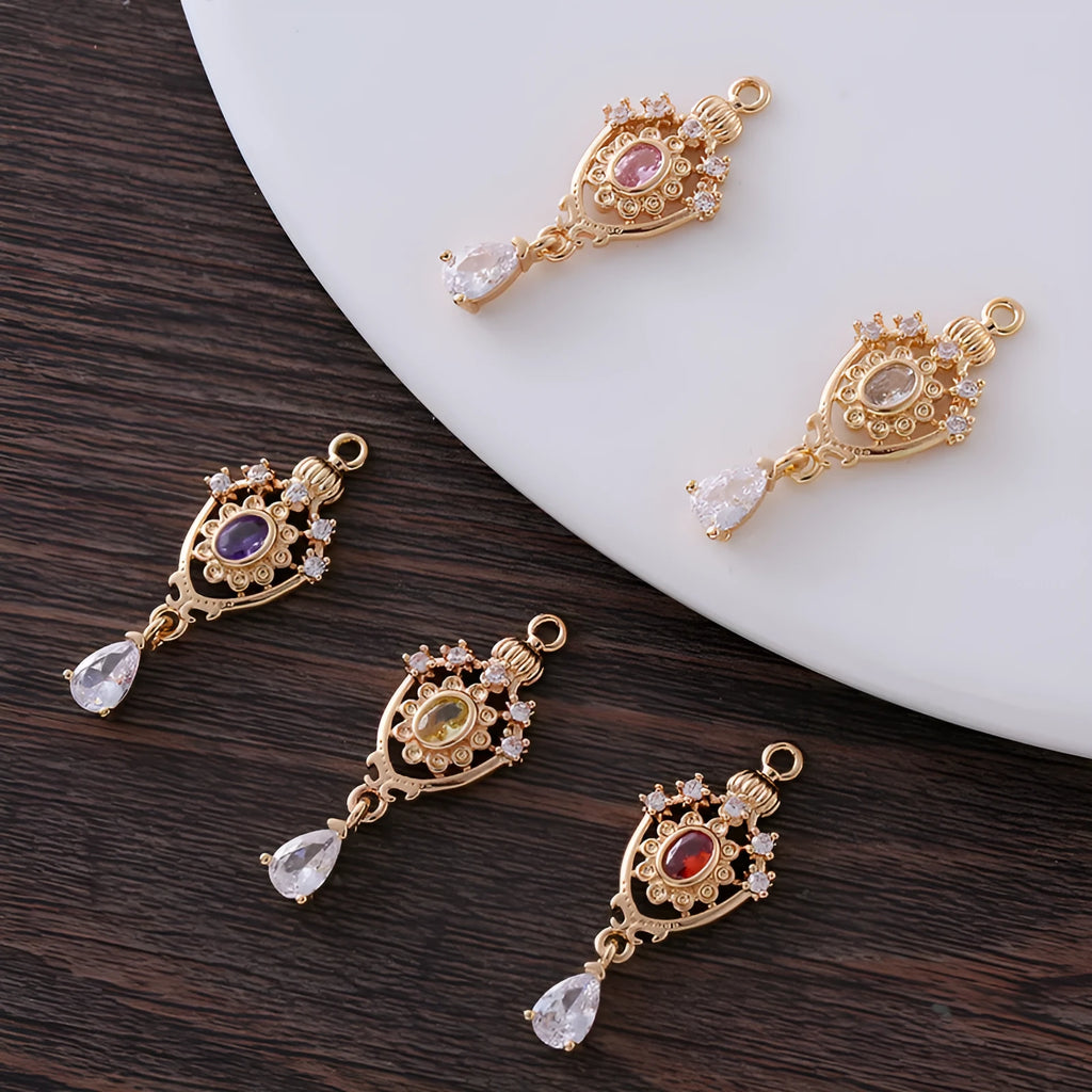 Micro inlaid zircon crown hollow water drop pendant in five colour options measuring 12x23mm
