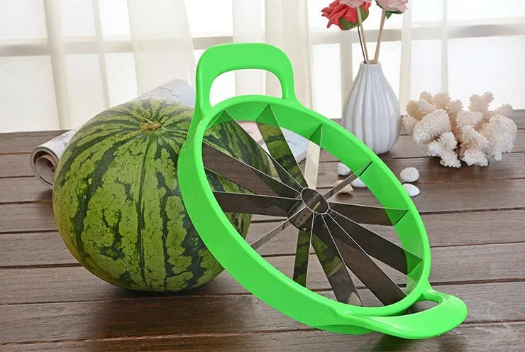 Multi-function fruit slicer cutting watermelon into 12 uniform slices with stainless steel blade and green PP plastic frame