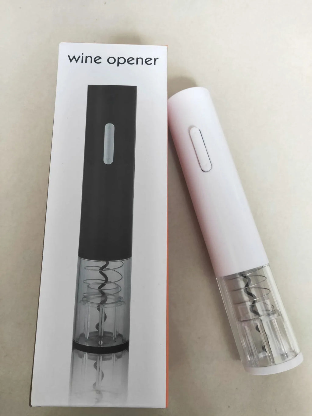 Automatic electric wine opener with foil cutter in black, red and white colour options.