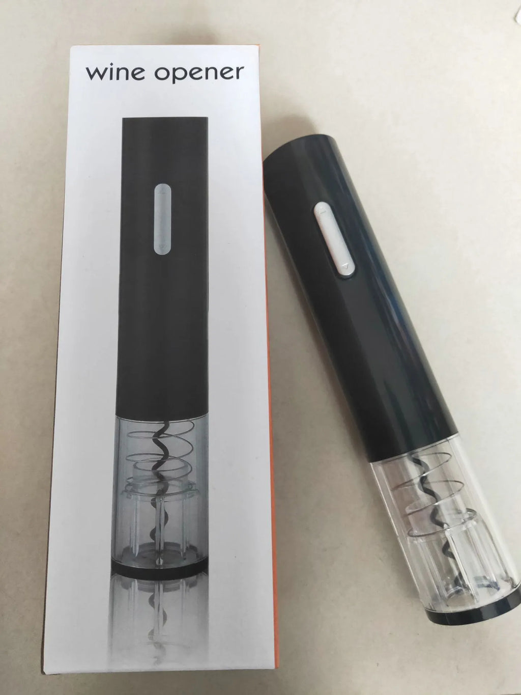 Automatic electric wine opener with foil cutter in black, red and white colour options.
