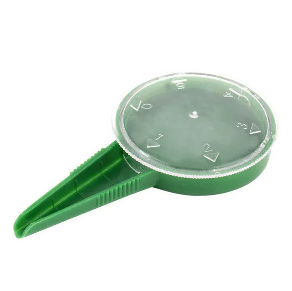 5-speed adjustable plastic seed sower in green with transparent body, 12cm length, for gardening planting