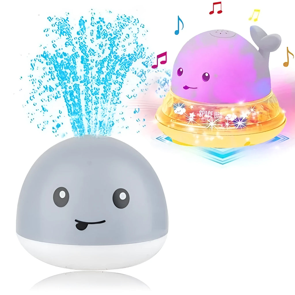 White and blue electric whale bath toy spraying water with lights on a base.