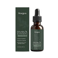Rosemary hair care oil 50ml bottle with ginger and castor oil on wooden surface
