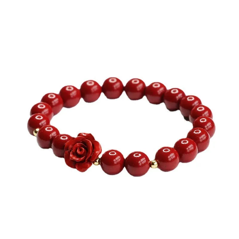 Natural cinnabar bracelet with 8mm rose-shaped beads in purple gold sandstone finish