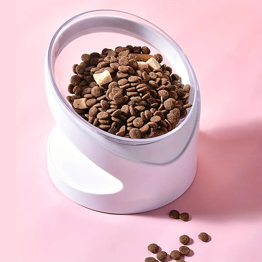 Clear plastic elevated cat food bowl with 15-degree tilt angle on white background
