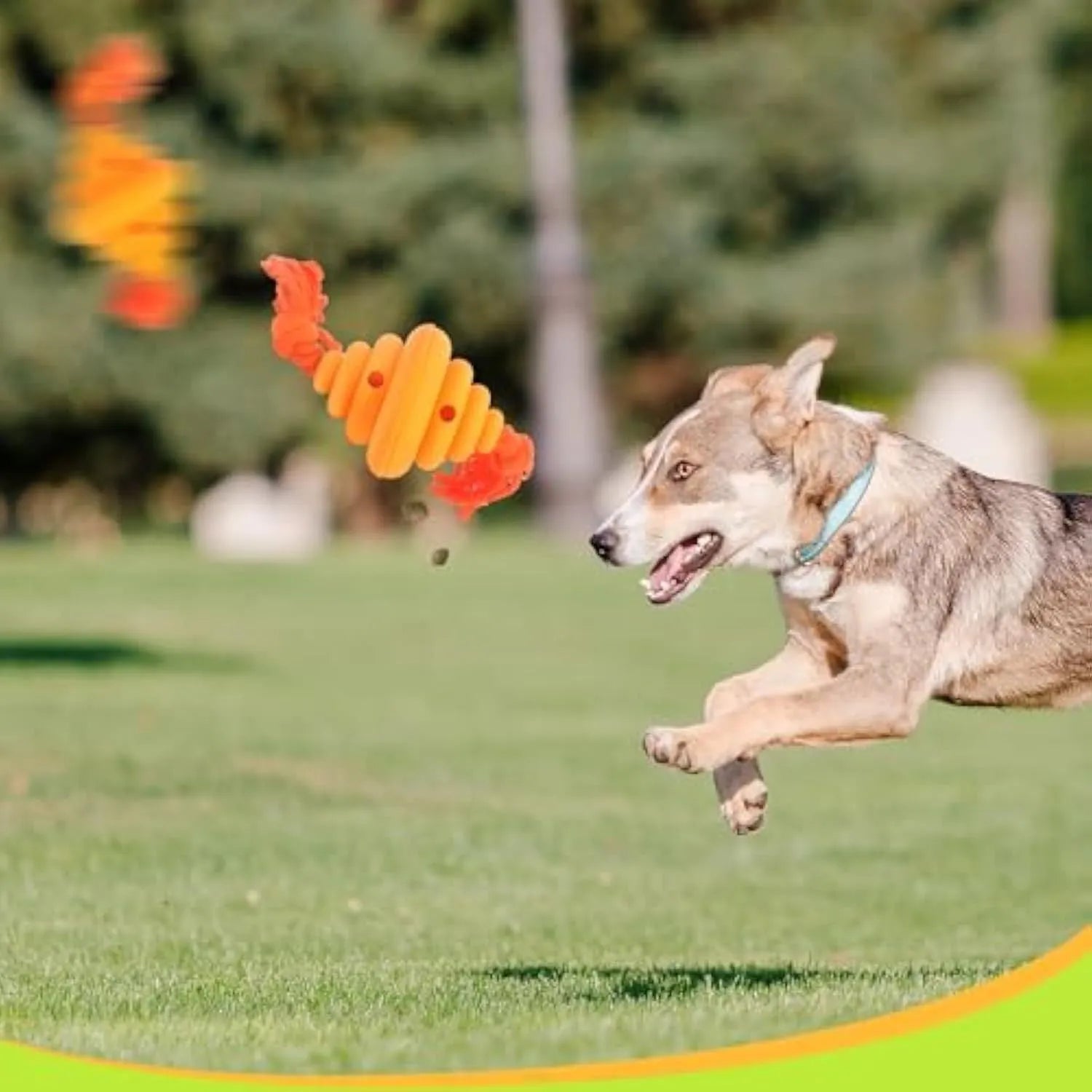 Green and yellow dog ball with rope toy for large breeds with treat dispenser