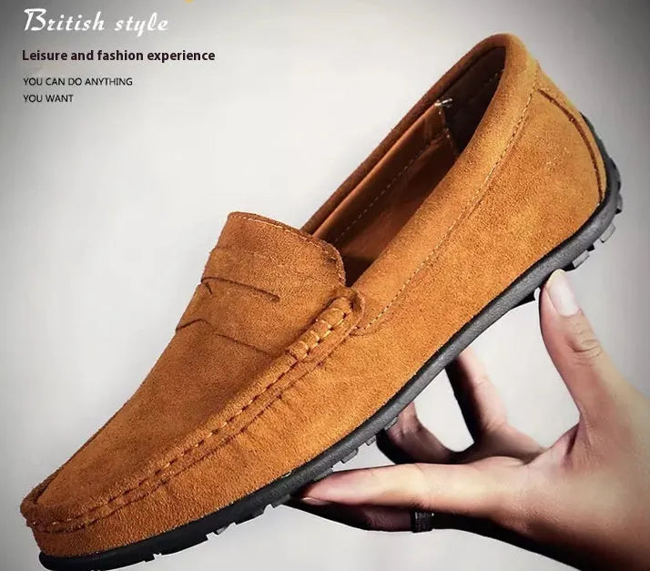 Men's suede Gommino loafers in brown with a round toe and flat rubber sole