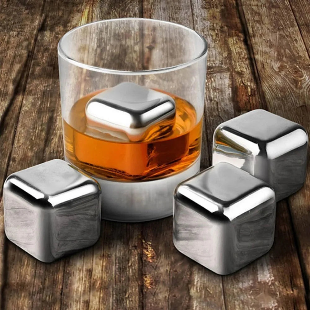8-piece stainless steel whiskey stones set with tongs in plastic box, various shapes including squares and diamonds