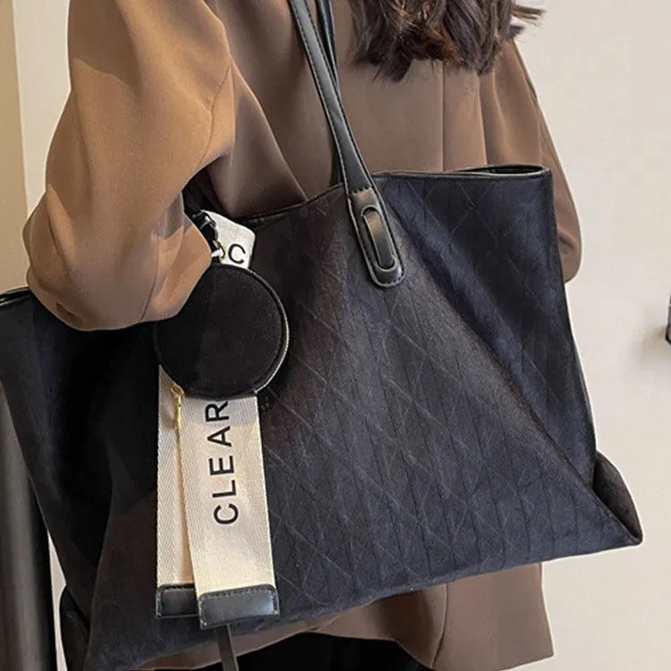 Soft polyester large tote shoulder bag in horizontal square shape with zippered pocket.