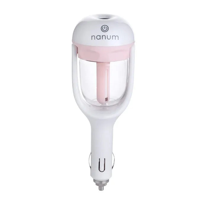 Compact blue car humidifier diffuser with rotating nozzle on a car dashboard